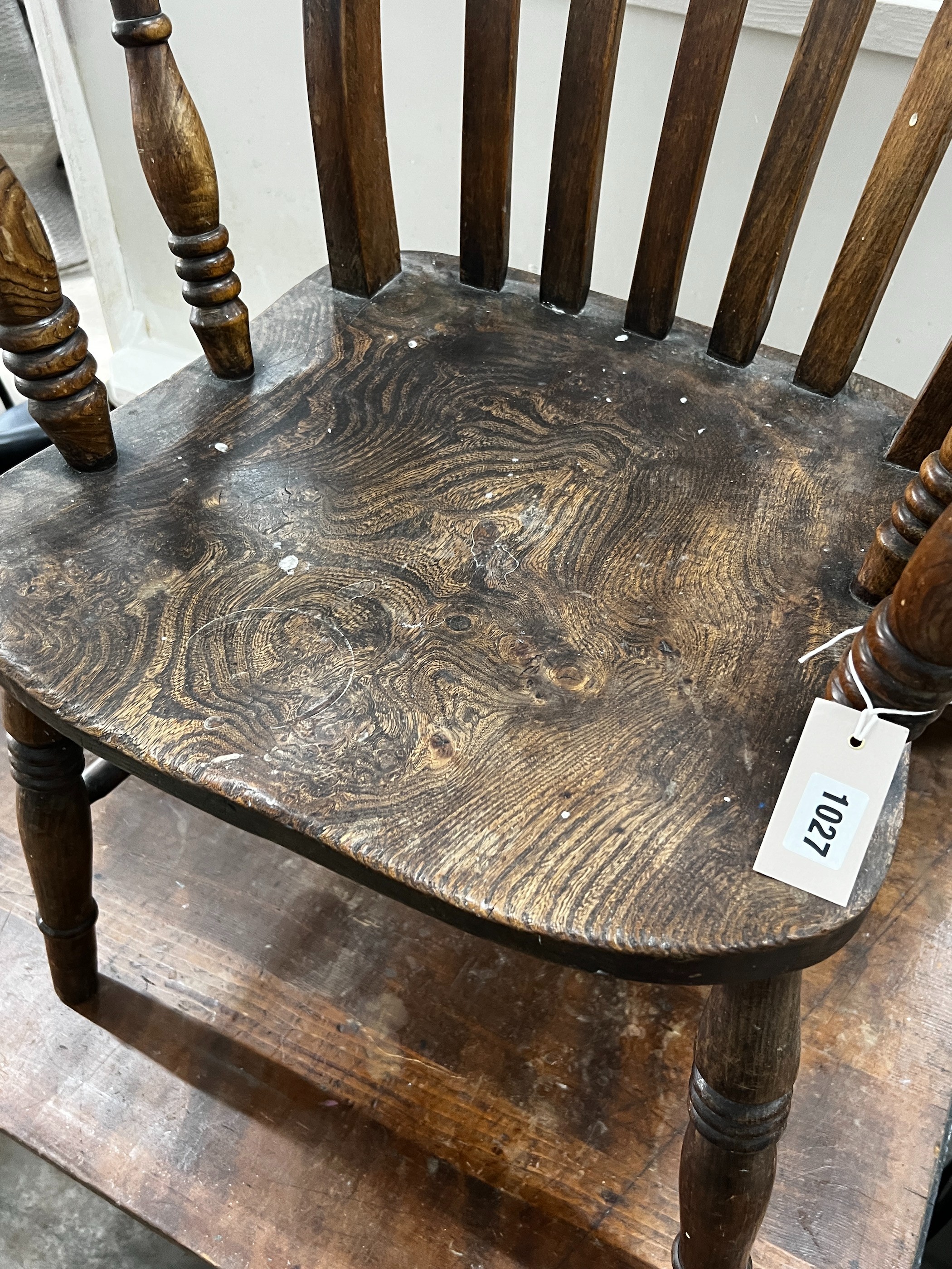A Victorian elm and beech lathe back armchair, width 55cm, depth 47cm, height 113cm